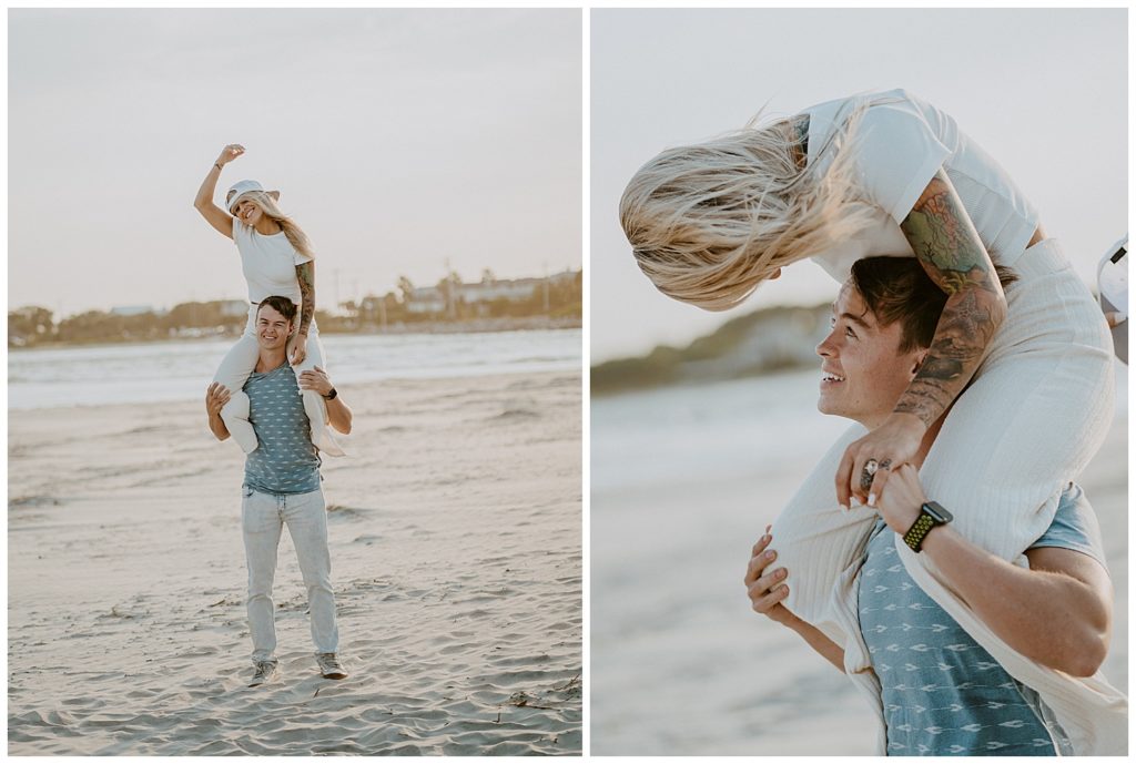 a couple posing on the beach in destin, fl on top of shoulders
