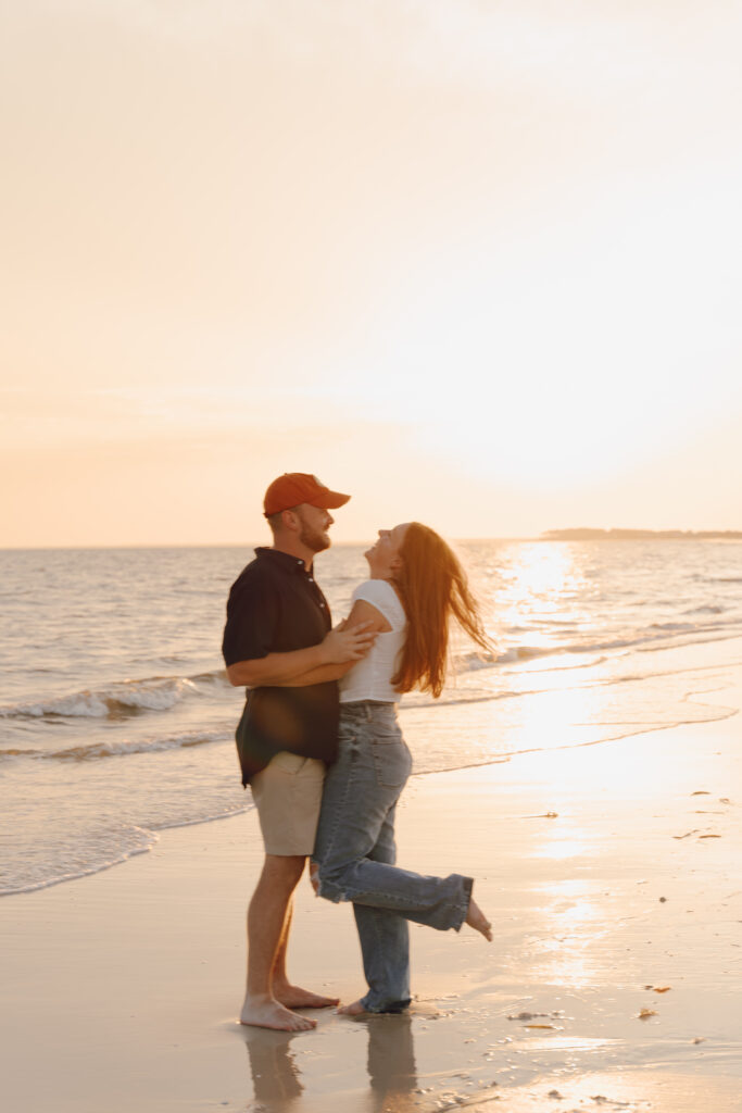 Couple dancing with each other during couples session at Alligator Point in Florida
