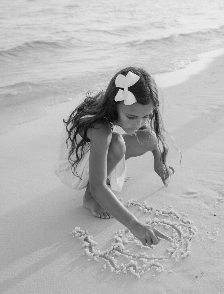 Girl playing in the sand