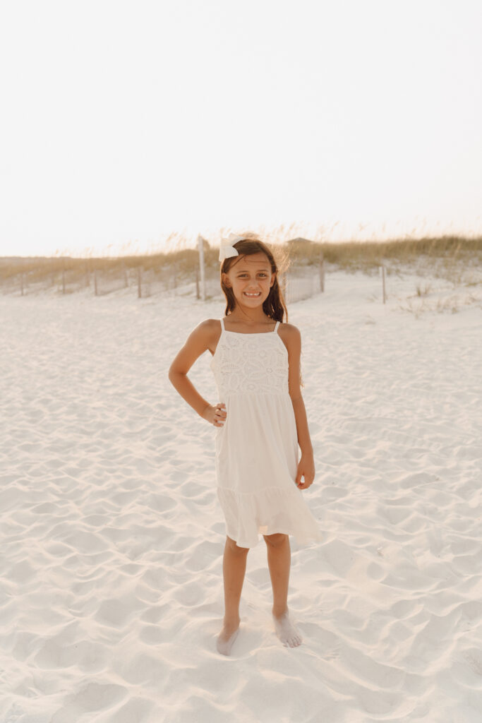 Girl at beach for family photoshoot