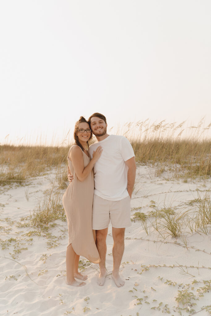 Couple at beach for family photoshoot