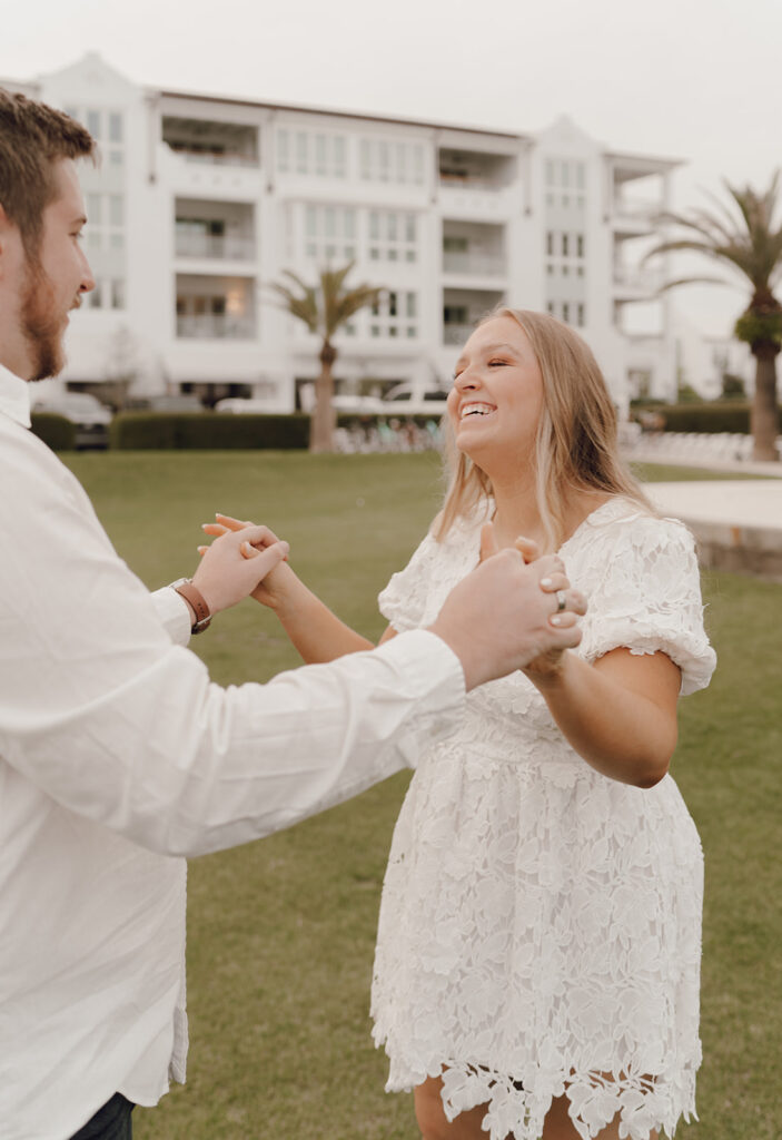 couple holding hands and laughing in Florida