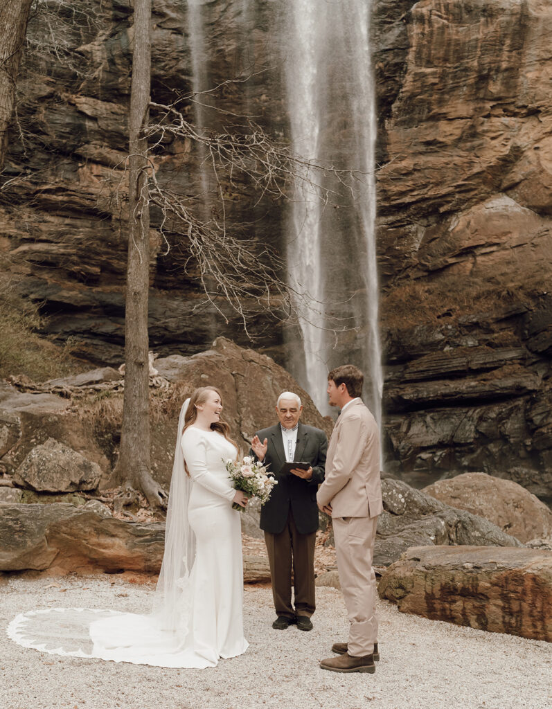 destination elopement cermony at toccoa falls with waterfall