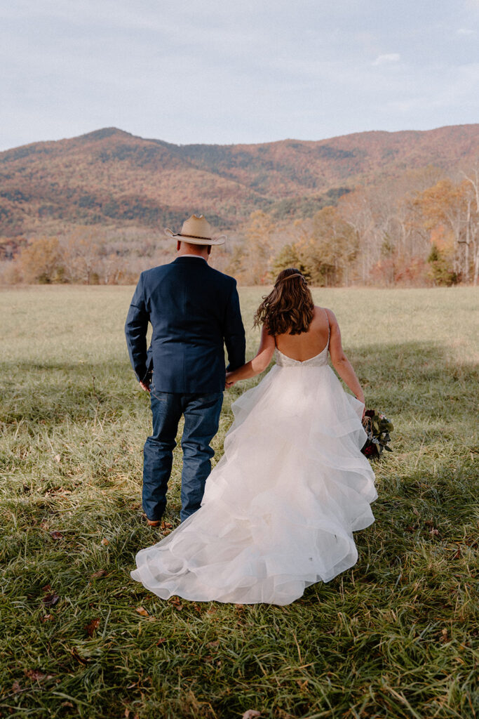 bride and groom facing great smoky mountains