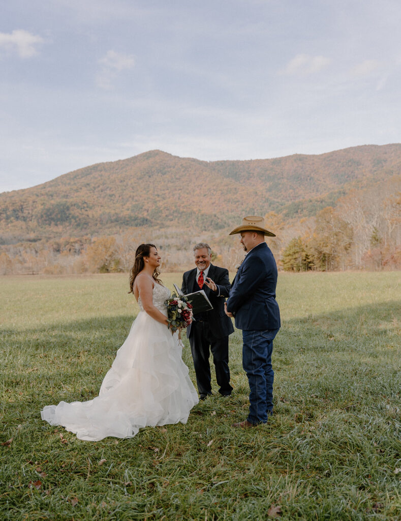 fall elopement ceremony couple in the mountains
