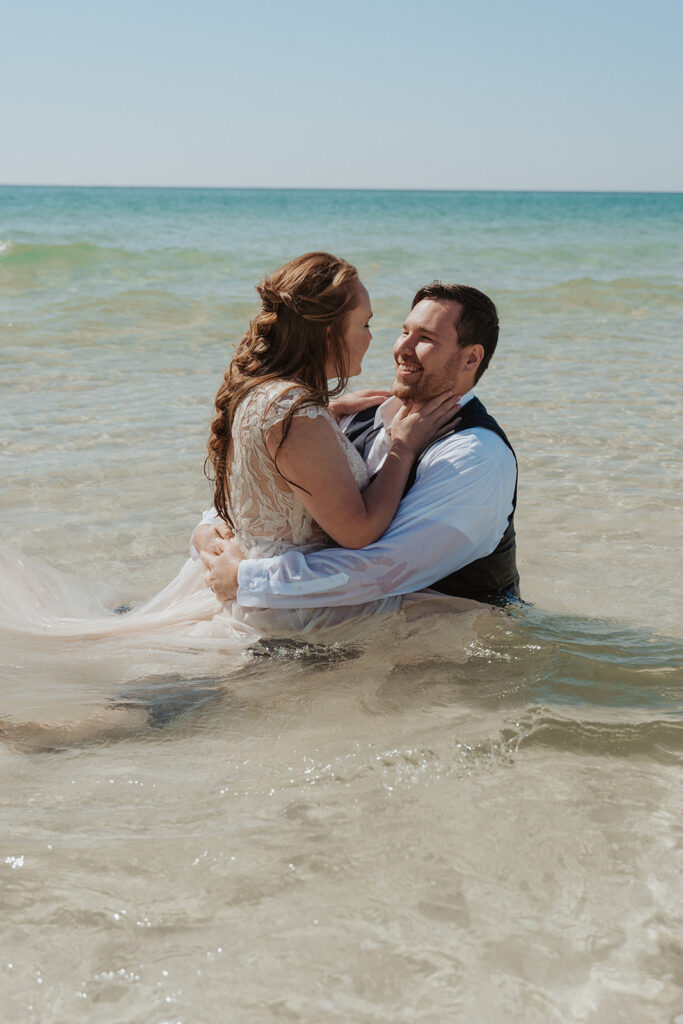 bride and groom wedding trash the dress photoshoot on the beach