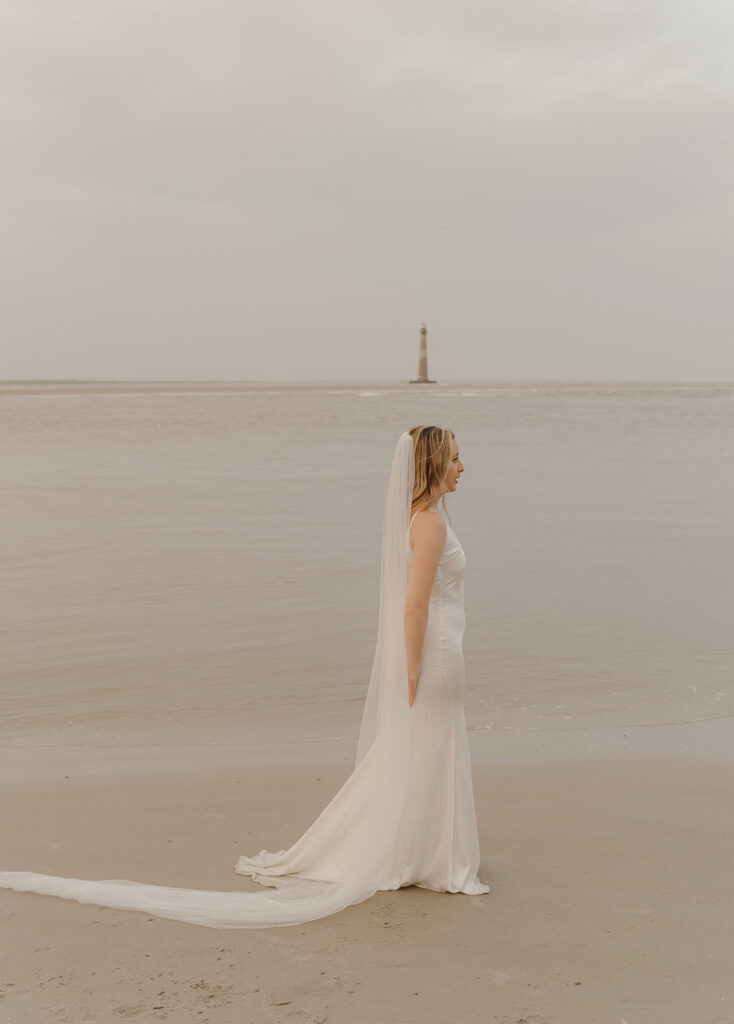 bridal elopement photo in front of south carolina water, dress detail photos