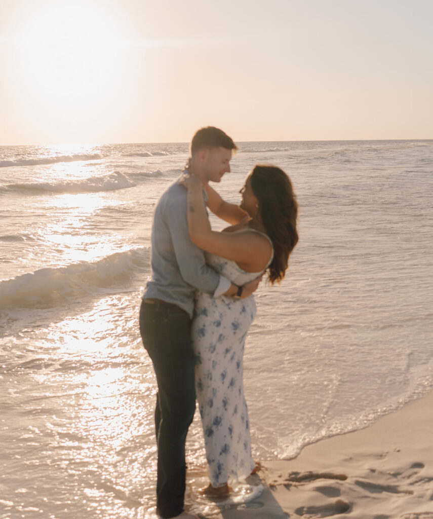 documentary style romantic meaternity photos on the beach