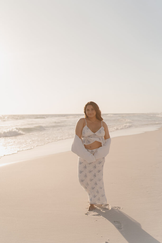 beach maternity photos during sunset on the beach in florida