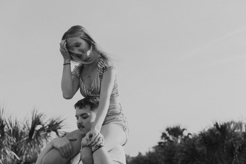 black and white playful engagement photos