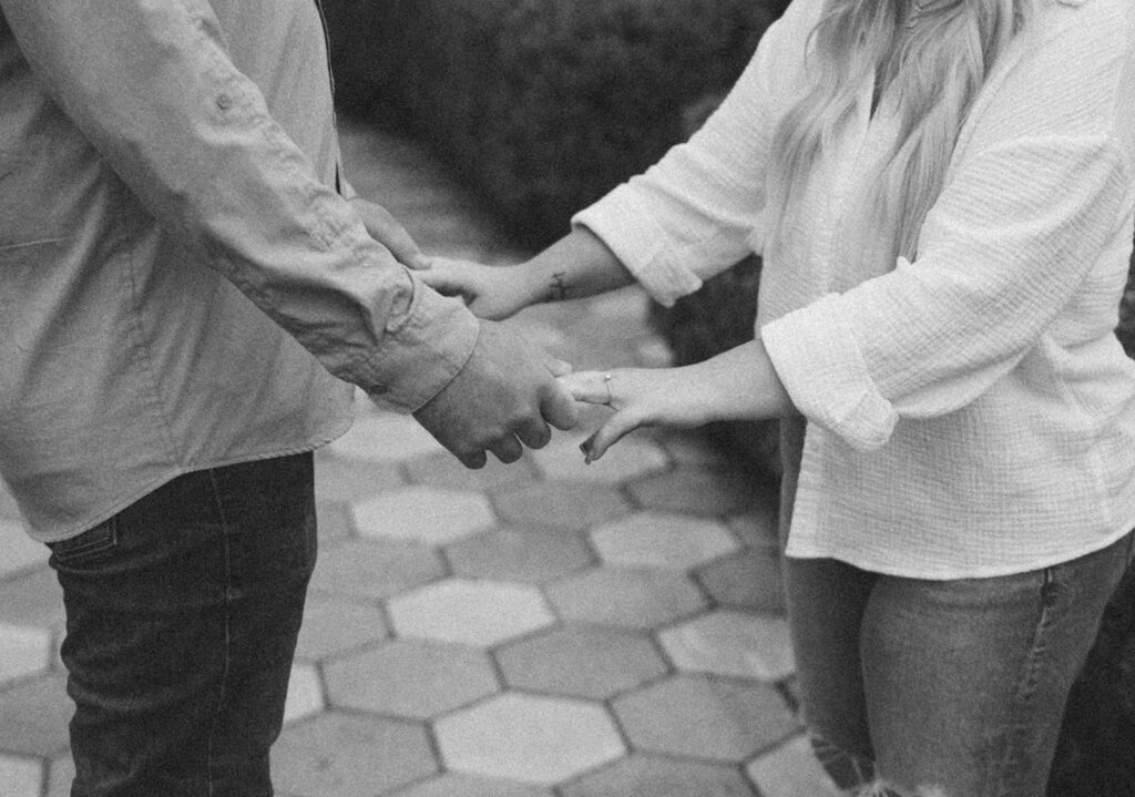 candid couple photos couple holding hands fall engagement photos