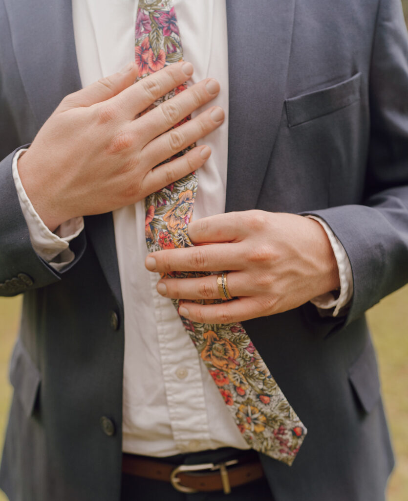 colorful tie groom wedding details