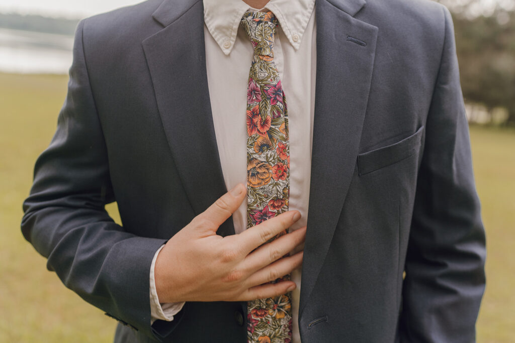 groom colorful tie wedding details portraits