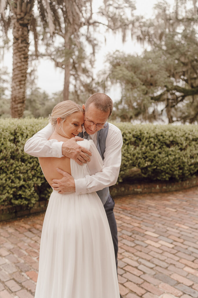 first look with dad outdoor intimate wedding