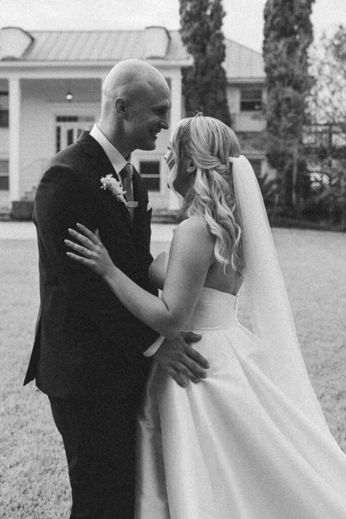 black and white film inspired wedding photos of bride and groom