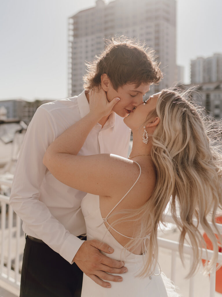 tampa engagement photographer romantic couple poses couple kissing