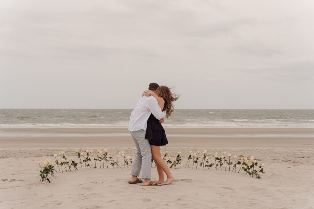 charleston proposal in isle of palms south carolina on the beach with flowers