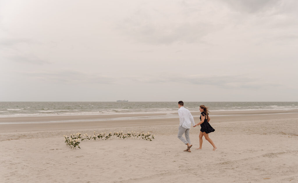 charleston proposal in isle of palms south carolina on the beach with flowers