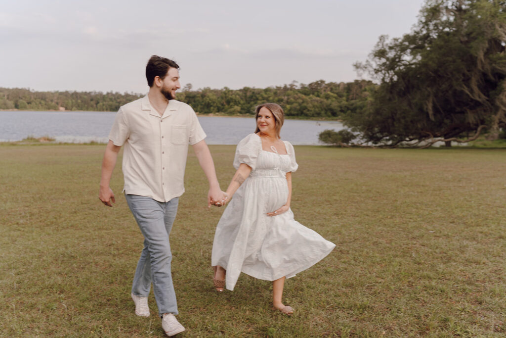 couple holding hands and running blurry photos documentary style photos