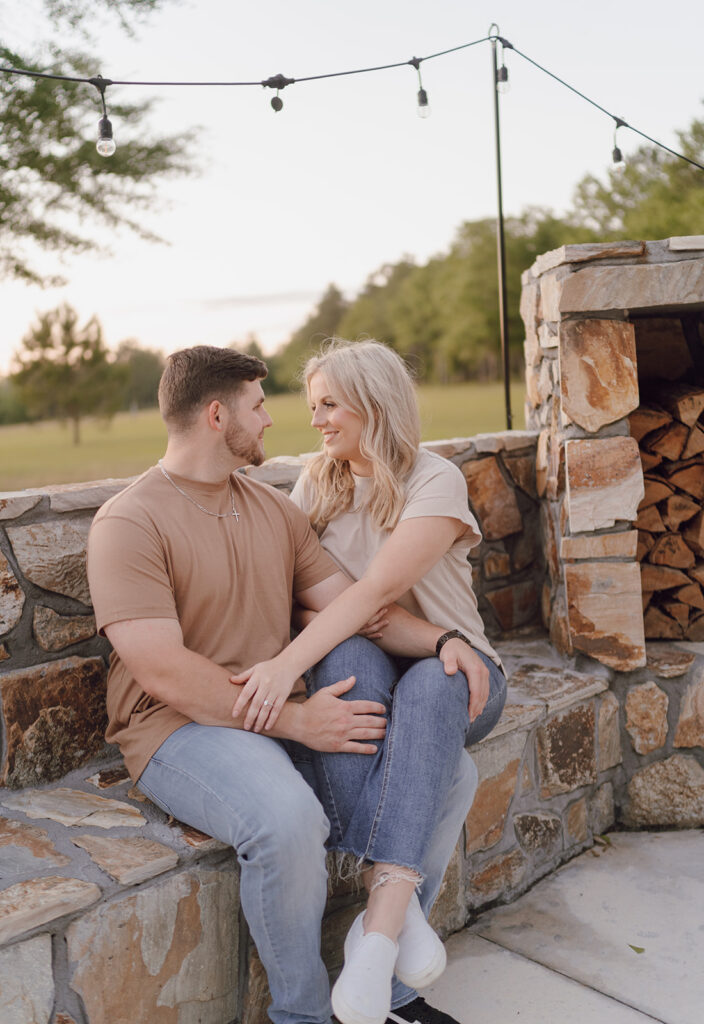 couple smiling at each other candid and romantic couples photoshoot