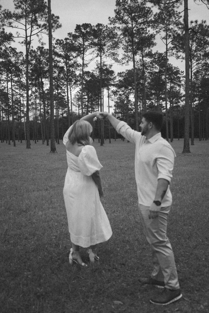 candid spinning pose during engagement session at Mount Pleasant Lodge