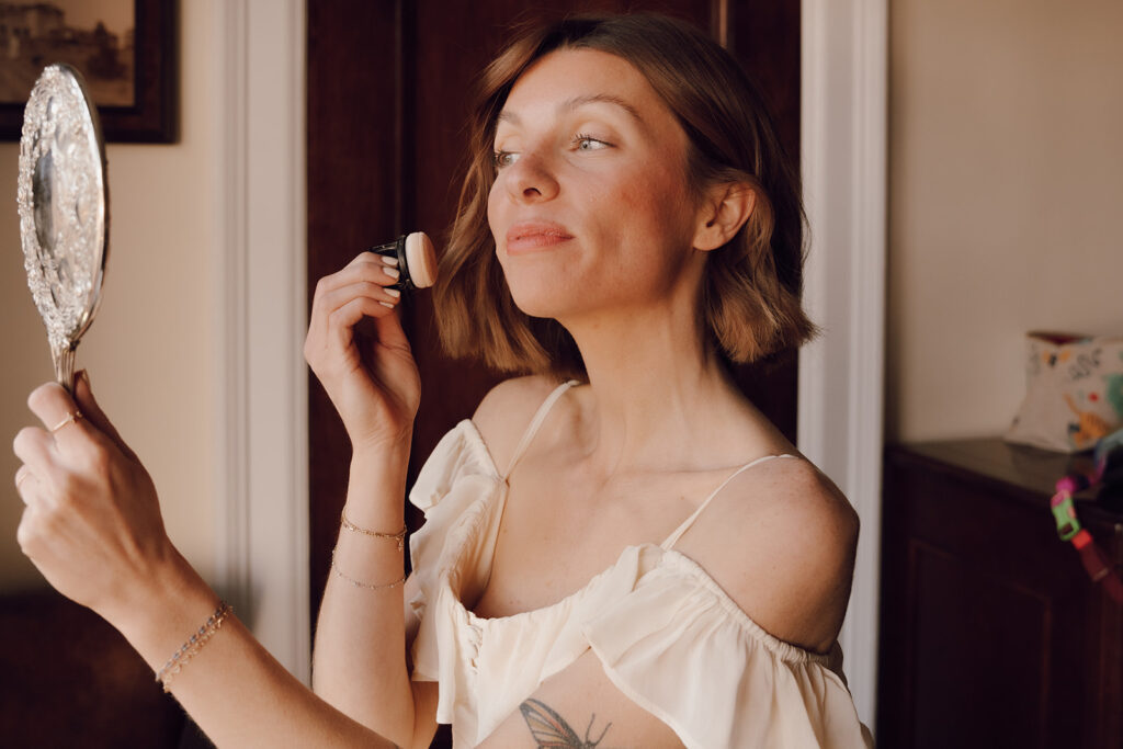 bride getting ready for colorado wedding in the mountains