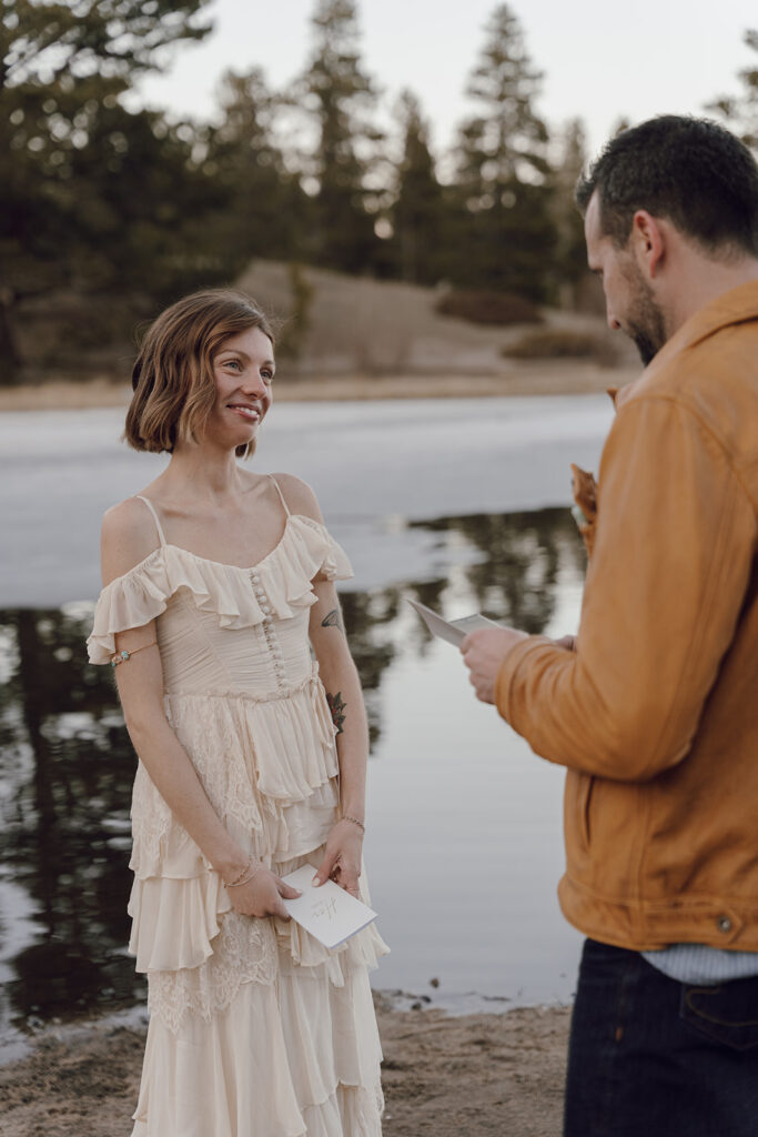 bride and groom exchange private vows in rocky mountain national park