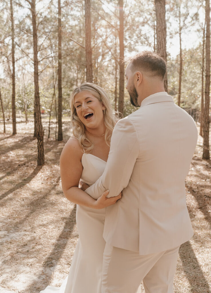 bride and groom first look candid moments couple laughing