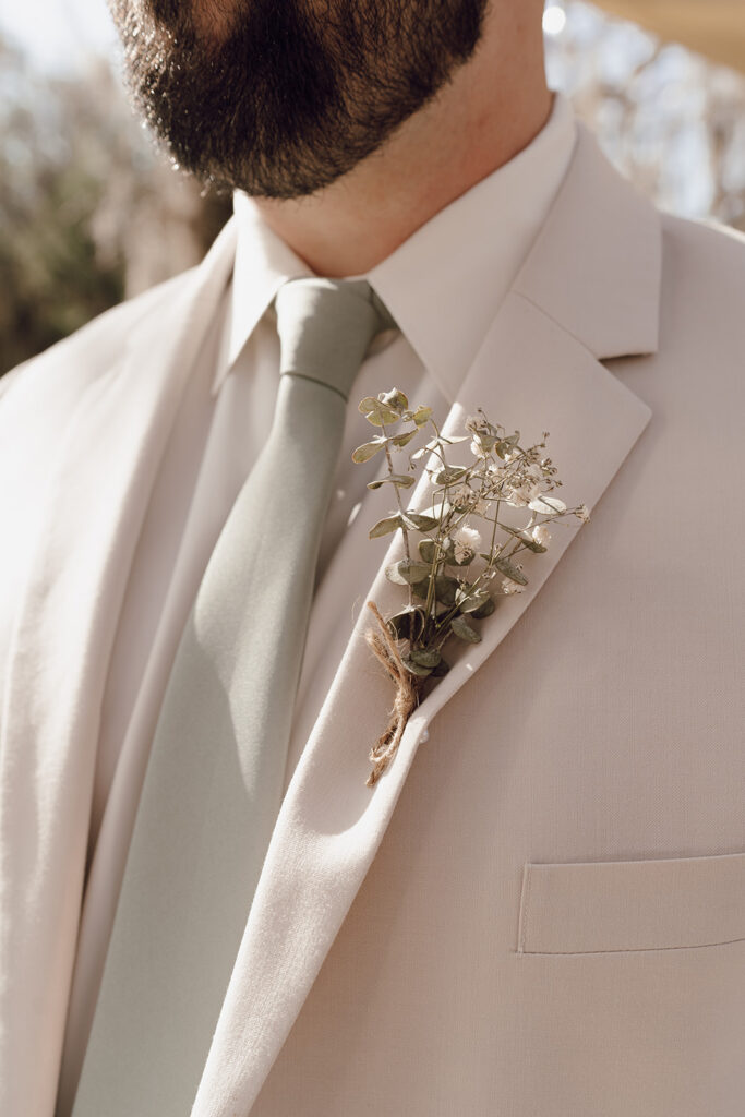 groom getting ready photos detail photos of suit