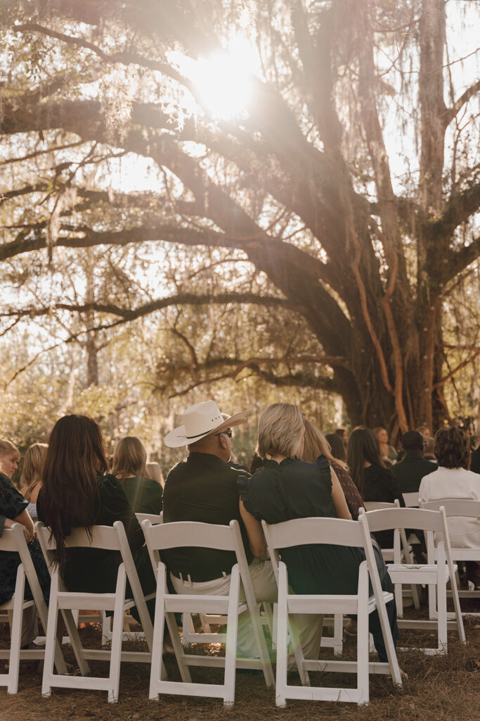 outdoor golden hour wedding ceremony in florida at the homestead barn