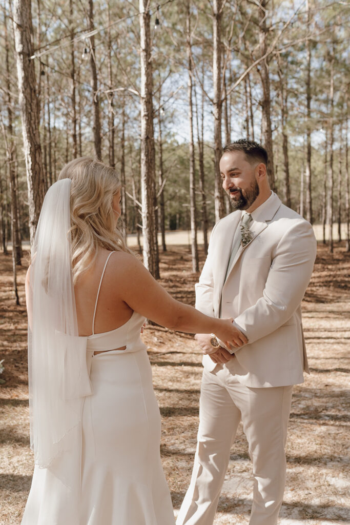 first look with bride and groom groom reaction