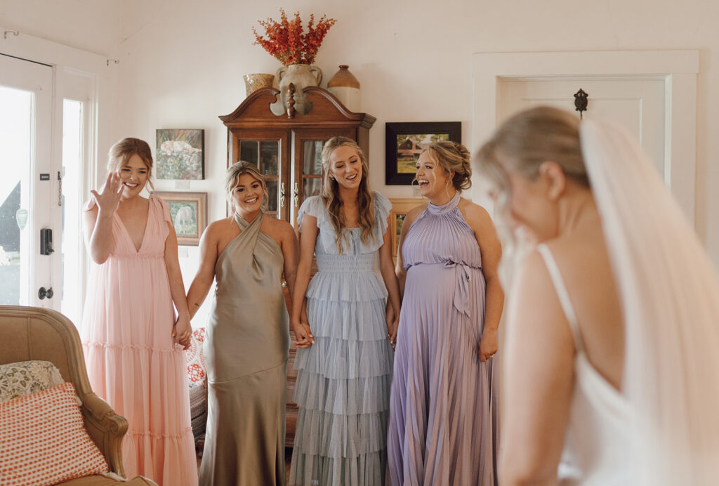 first look with bridesmaids for spring destination wedding