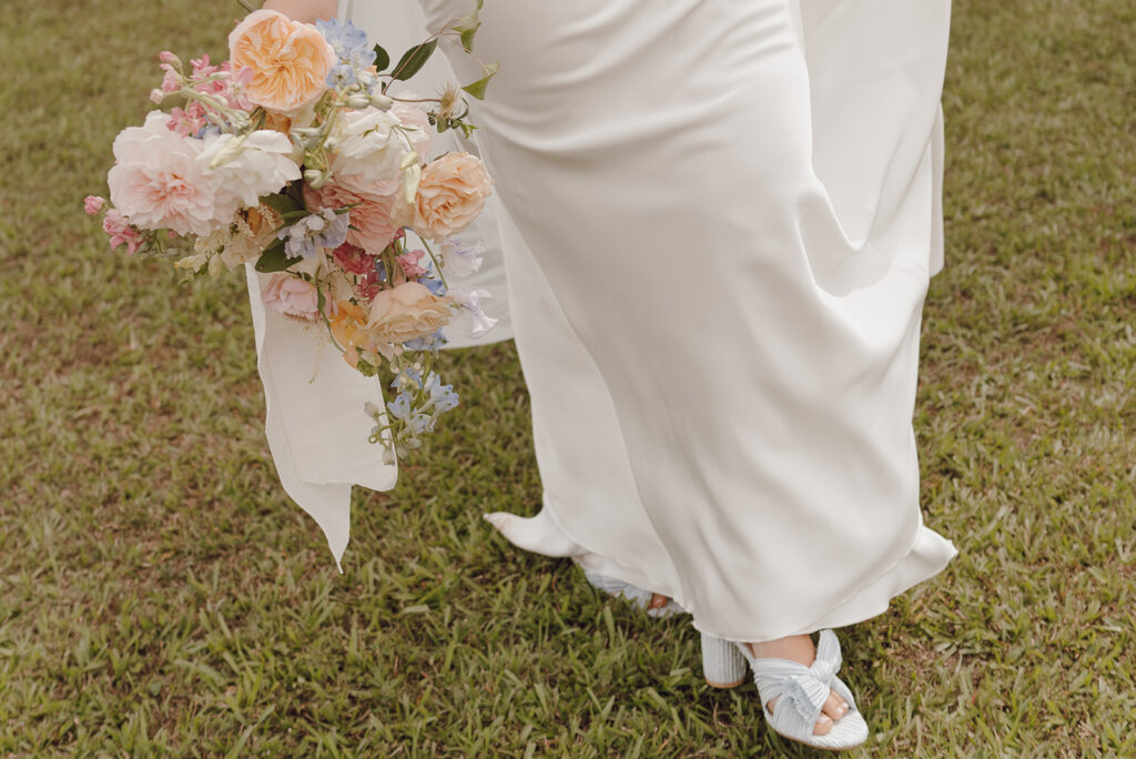 wedding detail photos dress and bouquet