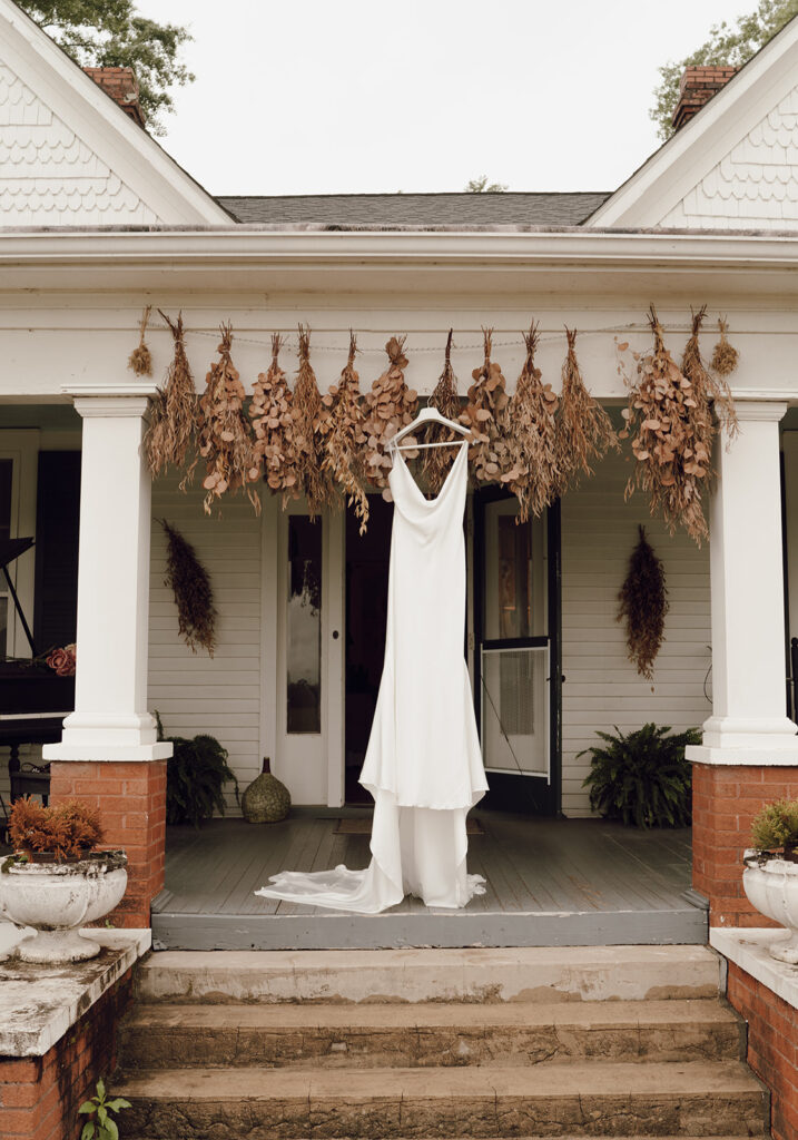 spring wedding getting ready photos dress hanging