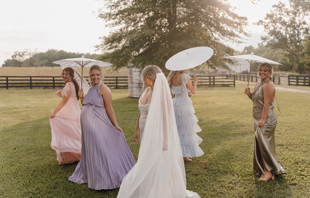 spring bridesmaid dresses pastel with umbrellas