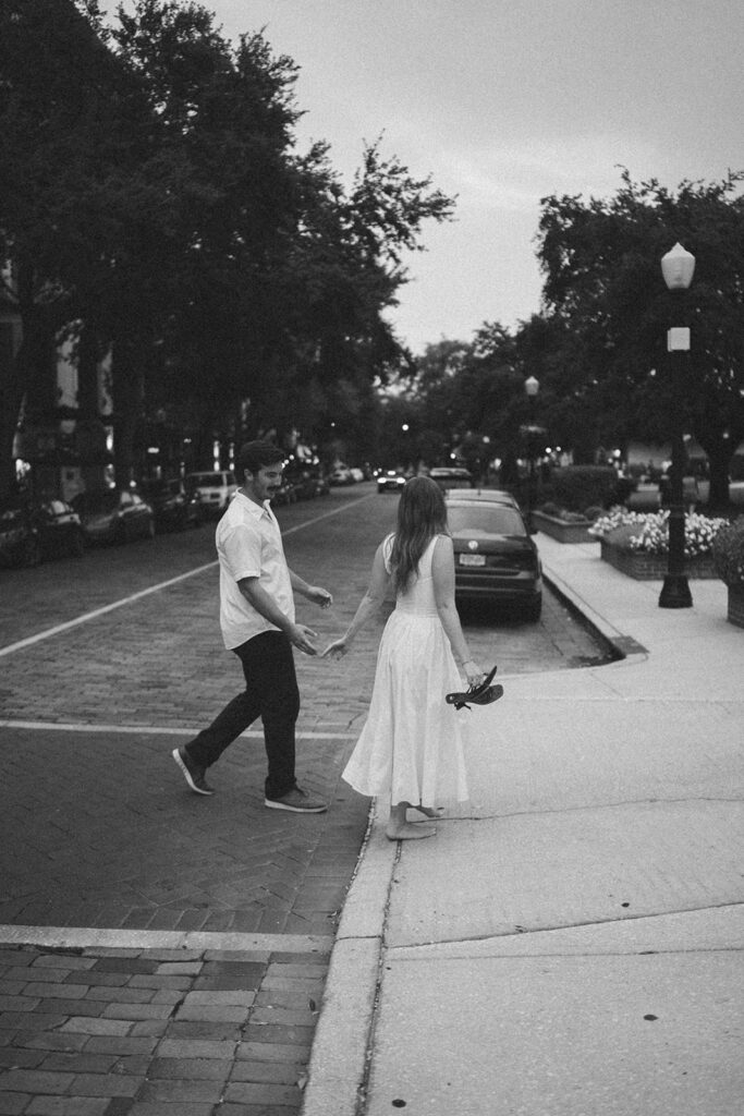 couple walking on the street blurry documentary style photos hannibal square