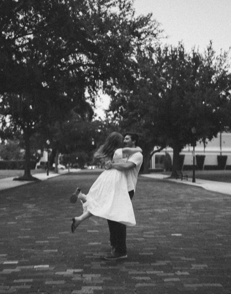 couple spinning pose candid and blurry hannibal square