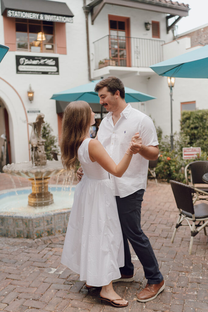 couple slow dancing for engagement photos