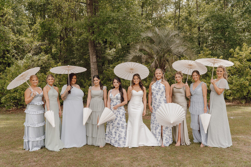 mismatch bridesmaid dresses with umbrellas