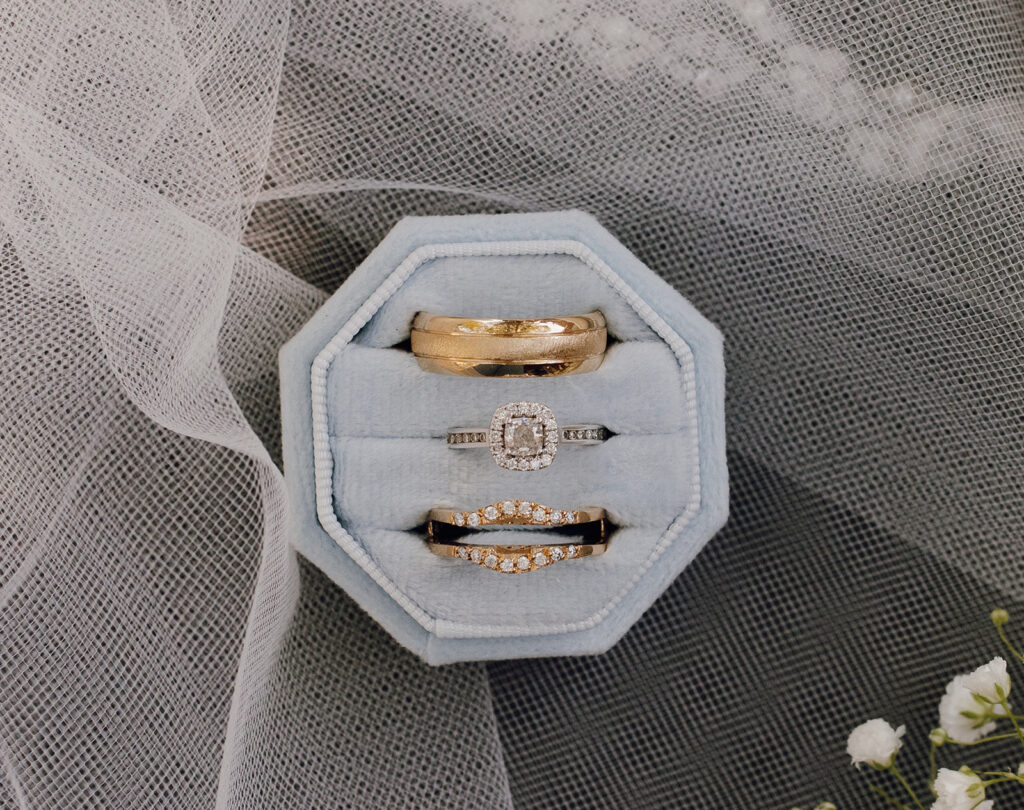 wedding ring photos with veil flatlay