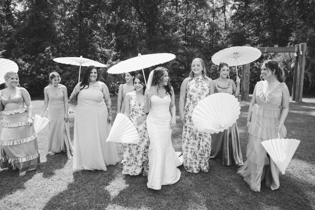 mismatch bridesmaid dresses with umbrellas