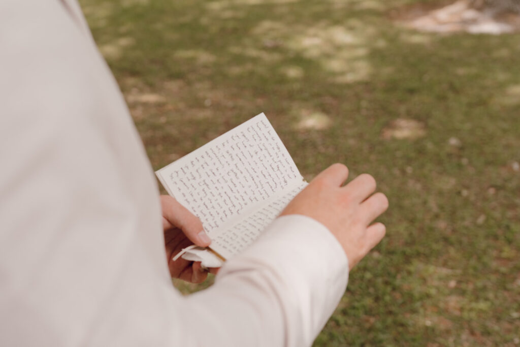 groom reading private vows