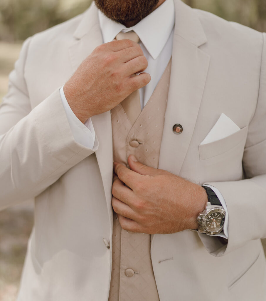 groom photos close up suit