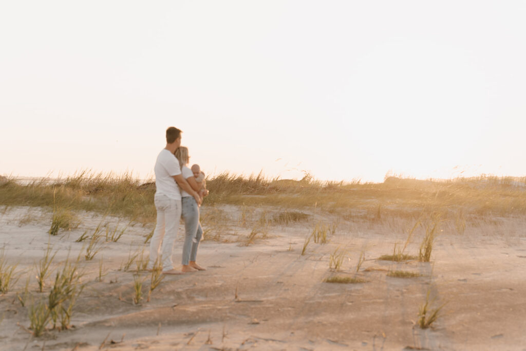 romantic couple photos with newborn baby documentary style