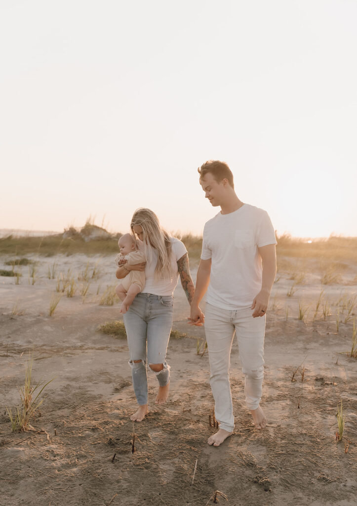 candid newborn photos at the beach in charleston