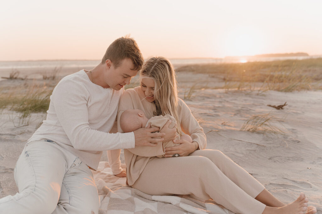 candid sunset beach newborn photos in South Carolina