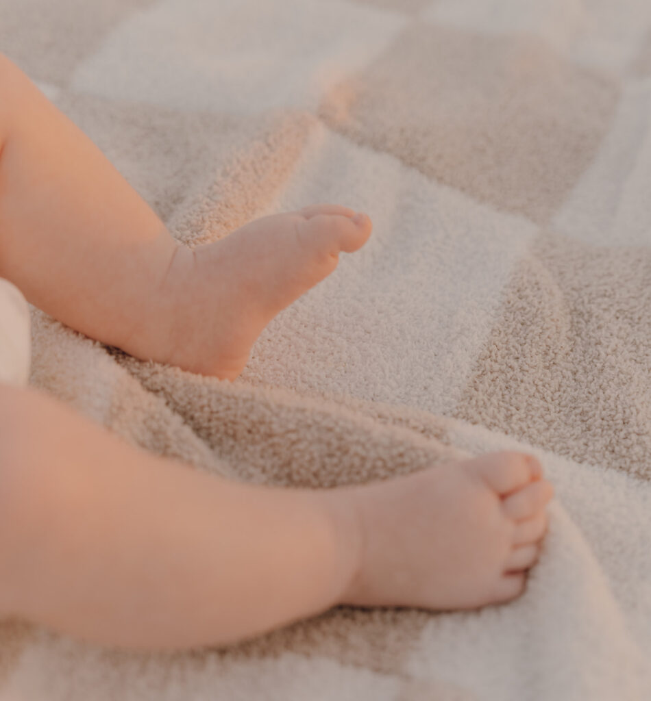 newborn session on the beach folly beach charleston south Carolina