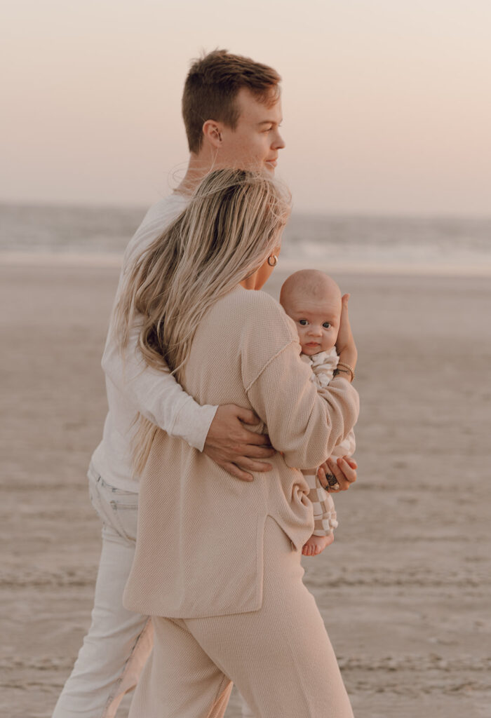 romantic couple photos with newborn baby documentary style