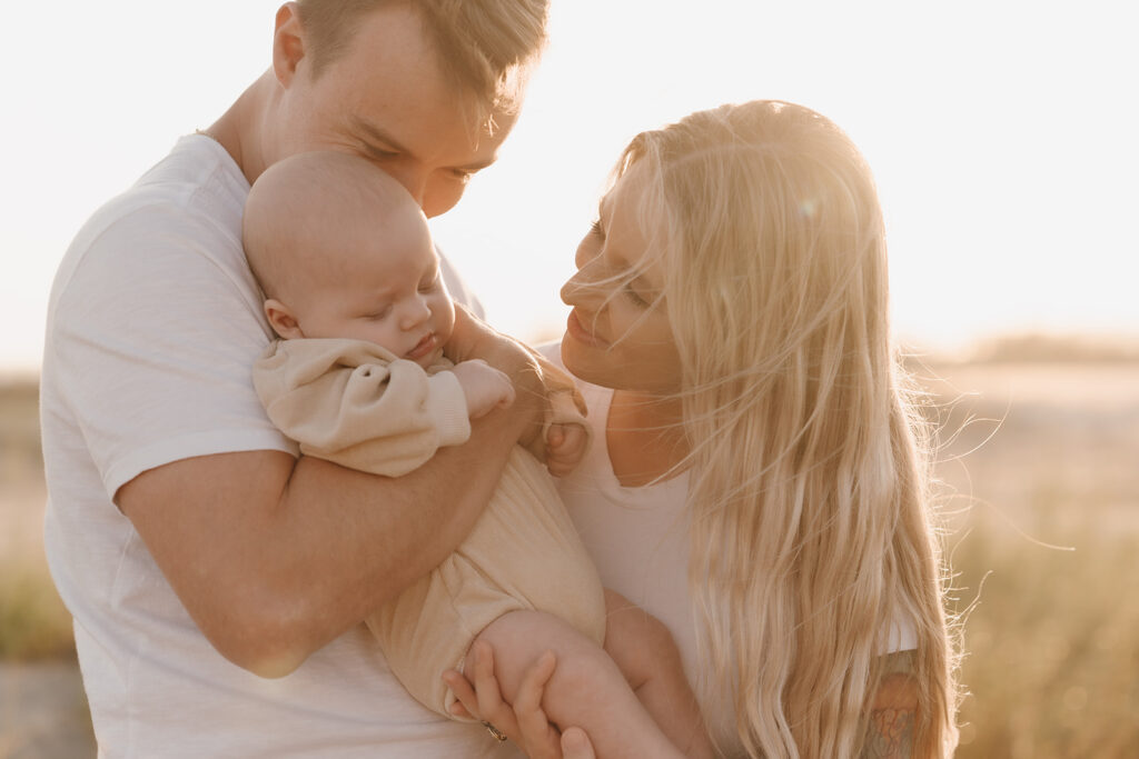 candid newborn photos at the beach in charleston