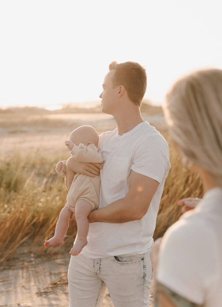 candid newborn photos at the beach in charleston